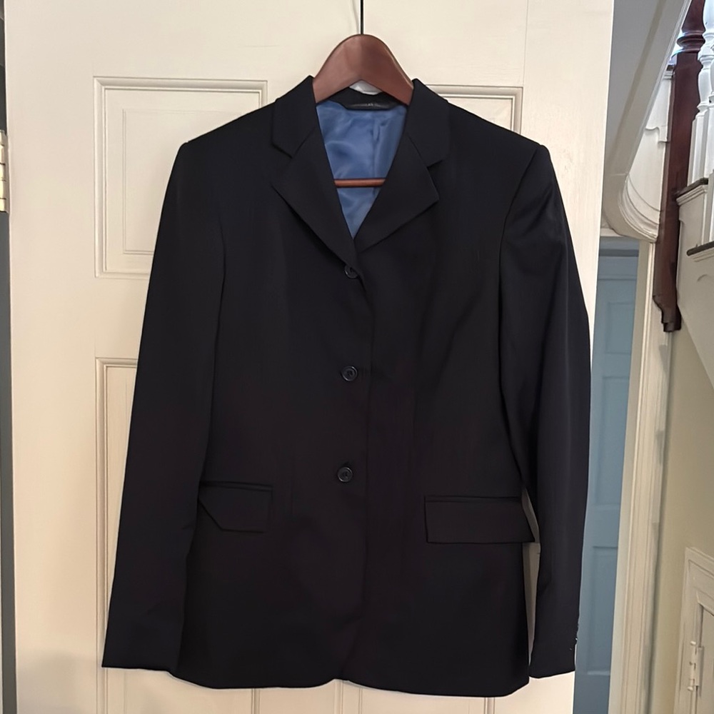 Dark navy equestrian Blazer with Notched Lapel and Structured Silhouette.